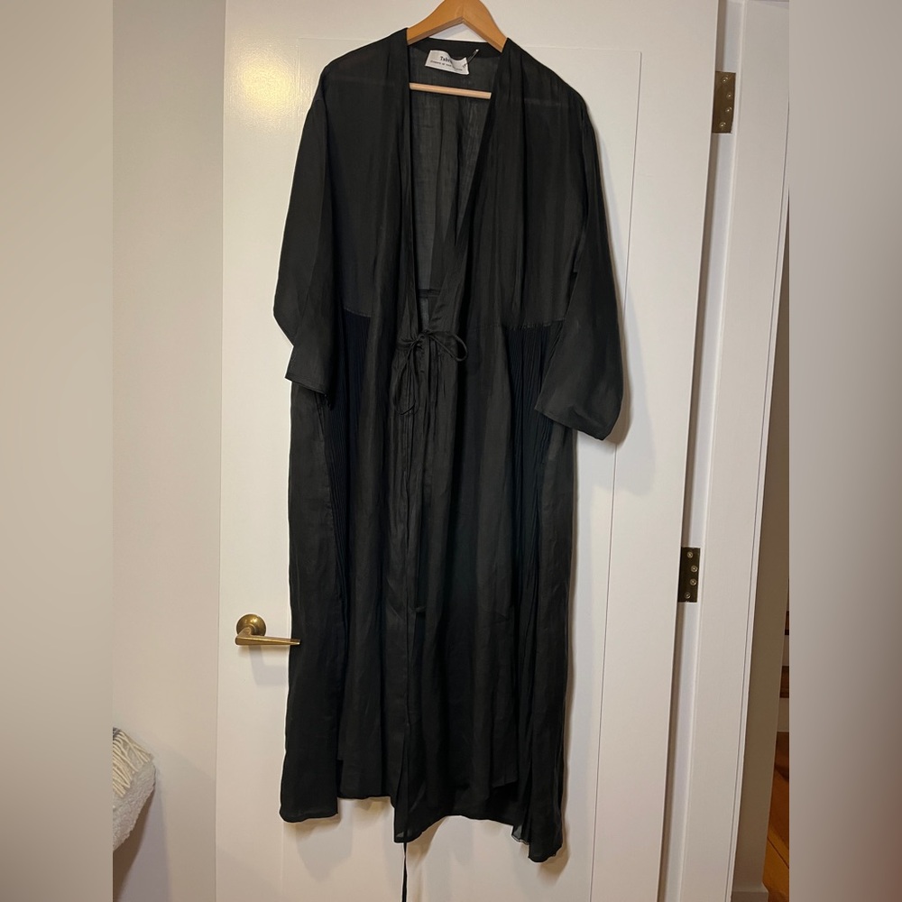 Black maxi length dress with tie.